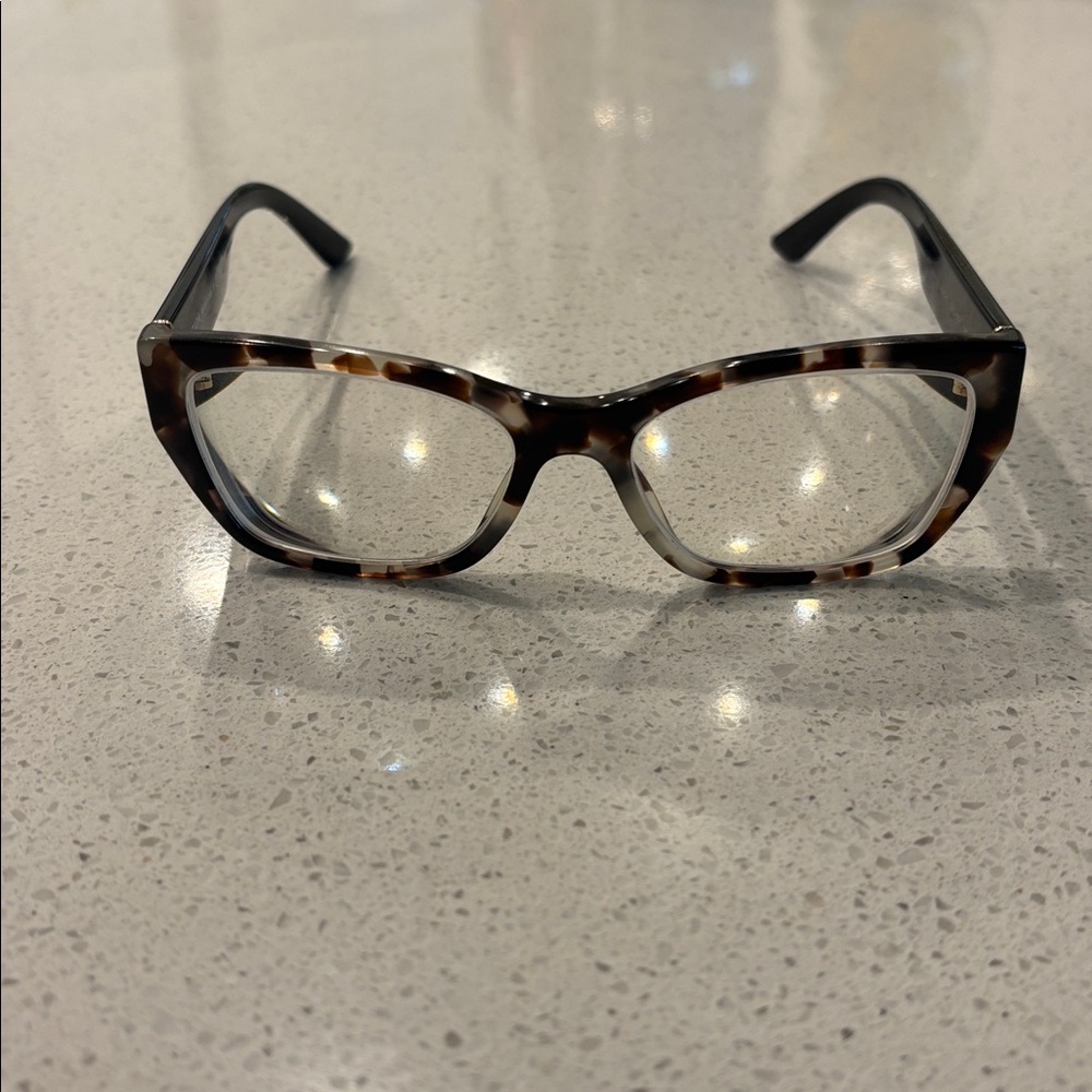 Prada tortoise shell slight cat eye frame 52
